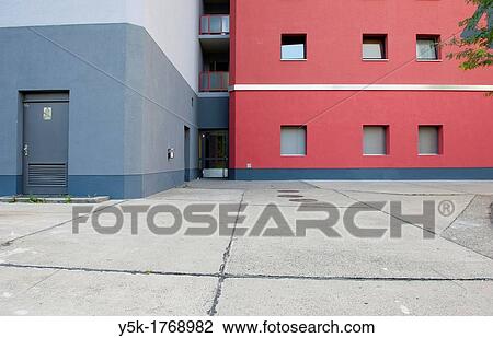 East-Berlin, Germany. Facade of Eastern-German? Plattenbau? first two floors, with a concrete square in front. View Large Photo Image Stock Image - East-Berlin, Germany. Facade of Eastern-German? Plattenbau? first two floors, with a concrete square in front.. Fotosearch