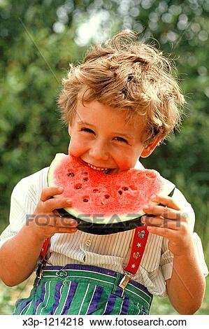 Eating a watermelon View Large Photo Image Stock Photo - Eating a watermelon. Fotosearch