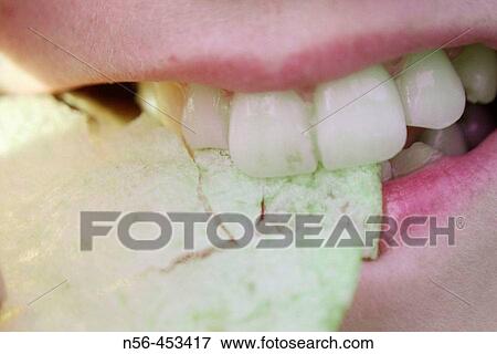 Eating chip View Large Photo Image Stock Photo - Eating chip. Fotosearch