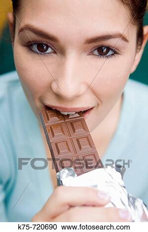 eating chocolate View Large Photo Image Stock Image - eating chocolate. Fotosearch