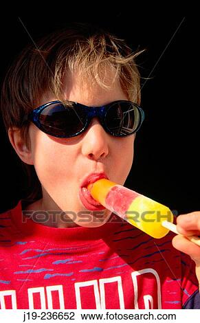 Eating icecream View Large Photo Image Stock Image - Eating icecream. Fotosearch