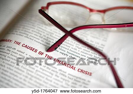 economy science book about financial crisis with glasses on out of focus View Large Photo Image Stock Photo - economy science book about financial crisis with glasses on out of focus. Fotosearch