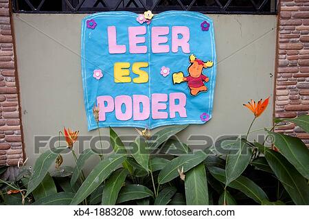 Stock Photo - Ecuador, Babahoyo, school,? reading is power?.. Fotosearch