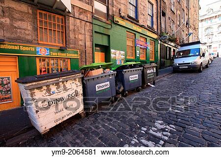 Edinburgh, city council trade waste containers in the back street of