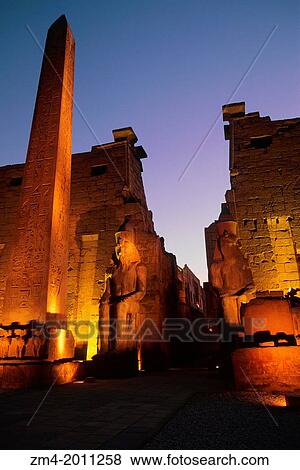 EGYPT, NILE RIVER, LUXOR, TEMPLE OF LUXOR, ENTRANCE WITH OBELISK AT NIGHT. View Large Photo Image Stock Photo - EGYPT, NILE RIVER, LUXOR, TEMPLE OF LUXOR, ENTRANCE WITH OBELISK AT NIGHT.. Fotosearch