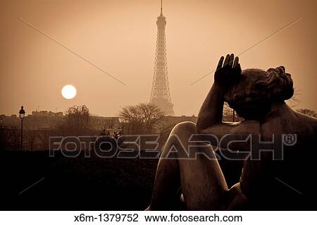 Eiffel Tower and sculptures at sunset from Tuileries Garden Paris, France View Large Photo Image Stock Image - Eiffel Tower and sculptures at sunset from Tuileries Garden Paris, France. Fotosearch
