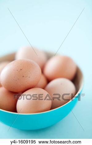 eight eggs in a blue bowl View Large Photo Image Stock Photography - eight eggs in a blue bowl. Fotosearch