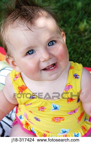 Eight month old baby with bathing suit in summer View Large Photo Image Picture - Eight month old baby with bathing suit in summer. Fotosearch