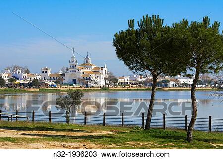 El Rocio village and Hermitage, Almonte El Rocio, El Rocio Marismas de Doana, Doana National Park, Huelva province, Andalusia Spain View Large Photo Image Stock Image - El Rocio village and Hermitage, Almonte El Rocio, El Rocio Marismas de Doana, Doana National Park, Huelva province, Andalusia Spain. Fotosearch