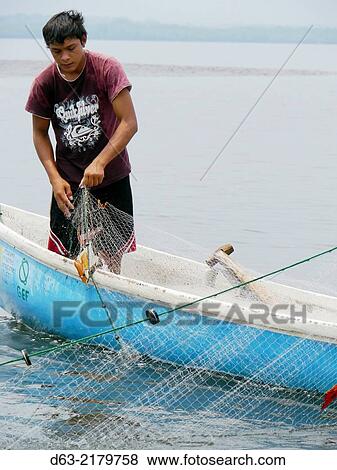 El Salvador. ADECHEPET project. (associascion de Desarrollo Comunal Hermanos Residentes en el Exterior Puerto El Triunfo). Visiting Fishermen on the nearby Isla El Espiritu Santo. View Large Photo Image Stock Photo - El Salvador. ADECHEPET project. (associascion de Desarrollo Comunal Hermanos Residentes en el Exterior Puerto El Triunfo). Visiting Fishermen on the nearby Isla El Espiritu Santo.. Fotosearch