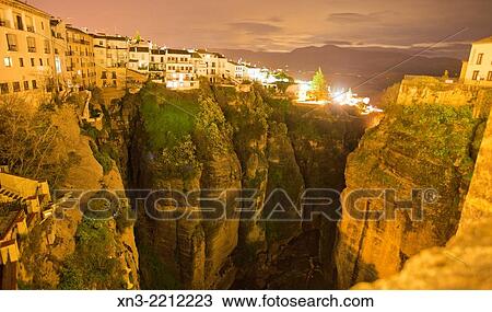 ? El Tajo? canyon or gorge of Ronda from New Bridge, Puente Nuevo, Guadalev? n River, Ronda, White Towns, Malaga province, Andalusia, Spain, Europe. View Large Photo Image Stock Image - ? El Tajo? canyon or gorge of Ronda from New Bridge, Puente Nuevo, Guadalev? n River, Ronda, White Towns, Malaga province, Andalusia, Spain, Europe.. Fotosearch