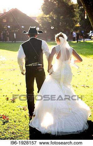 elated bride and groom going to the party / reception after wedding View Large Photo Image Stock Photo - elated bride and groom going to the party / reception after wedding. Fotosearch