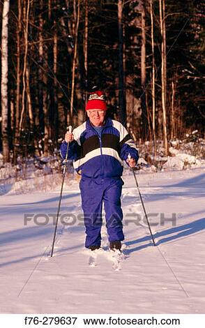 Elder man cross-country skiing. Lancaster. New Hampshire. USA View Large Photo Image Stock Photo - Elder man cross-country skiing. Lancaster. New Hampshire. USA. Fotosearch