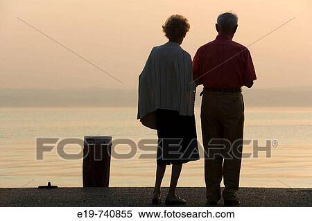 Elderly couple, Sirmione, Lake Garda, Lombardy, Italy View Large Photo Image Stock Photography - Elderly couple, Sirmione, Lake Garda, Lombardy, Italy. Fotosearch
