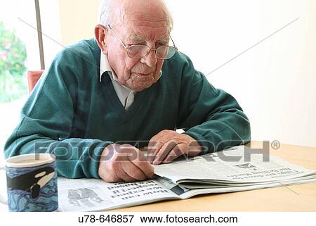 Elderly man reading newspaper. View Large Photo Image Stock Photo - Elderly man reading newspaper.. Fotosearch