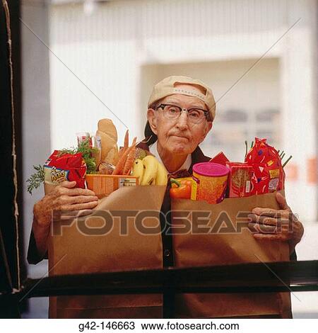 Elderly man with groceries View Large Photo Image Stock Image - Elderly man with groceries. Fotosearch