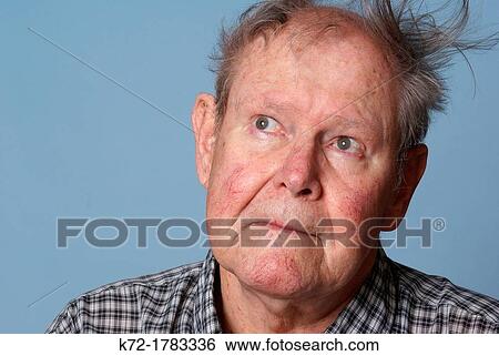 Stock Photograph - Elderly man with messy hair. Fotosearch