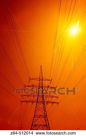 Electric mast at sunrise. View Large Photo Image Picture - Electric mast at sunrise.. Fotosearch