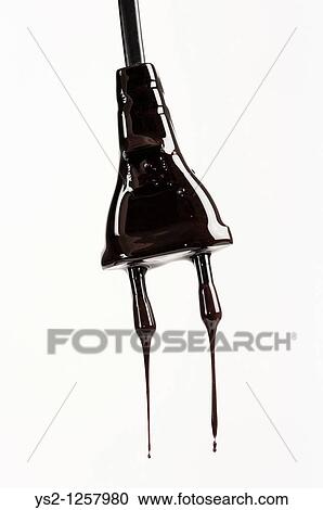 Electrical cord with black substance dripping View Large Photo Image Stock Image - Electrical cord with black substance dripping. Fotosearch