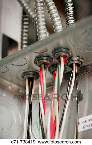 Electrical wires feeding through new electrical box View Large Photo Image Stock Photo - Electrical wires feeding through new electrical box. Fotosearch