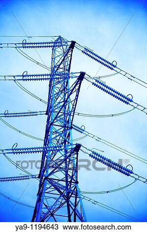 Electricity tower against the sky toned blue View Large Photo Image Stock Image - Electricity tower against the sky toned blue. Fotosearch