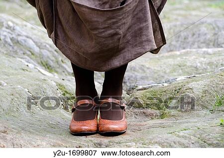 Elegant womans legs with shoes and skirt View Large Photo Image Stock Photo - Elegant womans legs with shoes and skirt. Fotosearch