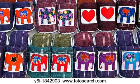 Elephant design slip-on slippers night market Luang Prabang Laos View Large Photo Image Stock Image - Elephant design slip-on slippers night market Luang Prabang Laos. Fotosearch
