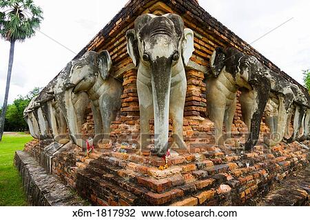 Elephants in a chedi Wat Sorasak Sukhothai Historical Park Thailand View Large Photo Image Stock Image - Elephants in a chedi Wat Sorasak Sukhothai Historical Park Thailand. Fotosearch
