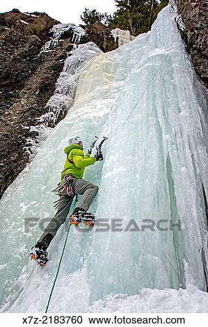 Elijah Weber ice climbing a route called Hang Over which is rated WI-3 and located in Hyalite Canyon in the Gallatin Mountains near the city of Bozeman in southern Montana. View Large Photo Image Stock Image - Elijah Weber ice climbing a route called Hang Over which is rated WI-3 and located in Hyalite Canyon in the Gallatin Mountains near the city of Bozeman in southern Montana.. Fotosearch
