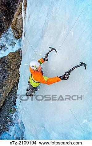 Elijah Weber ice climbing Lower Falls Right which is rated WI-4 and located at Shoshone Falls in the Snake River Canyon near the city of Twin Falls in southern Idaho. View Large Photo Image Picture - Elijah Weber ice climbing Lower Falls Right which is rated WI-4 and located at Shoshone Falls in the Snake River Canyon near the city of Twin Falls in southern Idaho.. Fotosearch