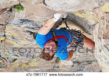 Elijah Weber rock climbing a route called Yellow Wall which is rated 5, 9 and located on Yellow Wall at The City Of Rocks National Reserve near the town of Almo in southern Idaho. View Large Photo Image Stock Photo - Elijah Weber rock climbing a route called Yellow Wall which is rated 5, 9 and located on Yellow Wall at The City Of Rocks National Reserve near the town of Almo in southern Idaho.. Fotosearch