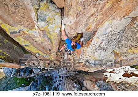 Elijah Weber rock climbing a route called Yellow Wall which is rated 5, 9 and located on Yellow Wall at The City Of Rocks National Reserve near the town of Almo in southern Idaho. View Large Photo Image Stock Photo - Elijah Weber rock climbing a route called Yellow Wall which is rated 5, 9 and located on Yellow Wall at The City Of Rocks National Reserve near the town of Almo in southern Idaho.. Fotosearch