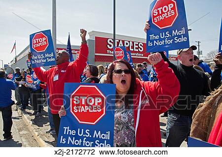 Elmwood Park, Illinois - Members of postal worker unions and other union activists attending the Labor Notes conference picket a Staples store to protest the U. S. Postal Service's plan to outsource postal services to the office supply chain. View Large Photo Image Stock Image - Elmwood Park, Illinois - Members of postal worker unions and other union activists attending the Labor Notes conference picket a Staples store to protest the U. S. Postal Service's plan to outsource postal services to the office supply chain.. Fotosearch