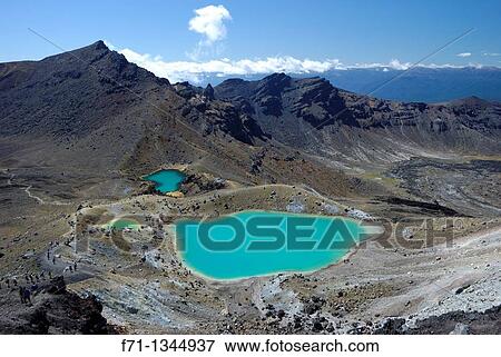 Emerald Lakes, Tongariro National Park The colour is caused by minerals leached from the surrounding rock North Island, New Zealand View Large Photo Image Stock Photo - Emerald Lakes, Tongariro National Park The colour is caused by minerals leached from the surrounding rock North Island, New Zealand. Fotosearch