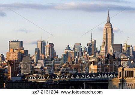 Empire State Building, New York City. Empire State Building seen from Queens. 350 Fifth Ave corner 34th St. View Large Photo Image Picture - Empire State Building, New York City. Empire State Building seen from Queens. 350 Fifth Ave corner 34th St.. Fotosearch