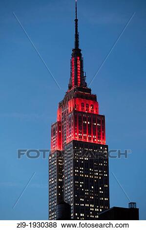 Empire State Building with red lighting View Large Photo Image Stock Photo - Empire State Building with red lighting. Fotosearch