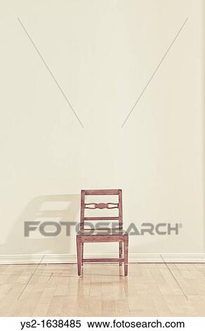Empty chair in an empty room View Large Photo Image Stock Photography - Empty chair in an empty room. Fotosearch
