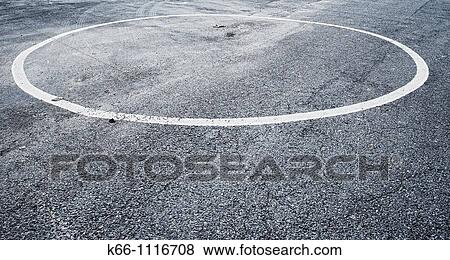 Stock Photo - Empty circle painted on road. Fotosearch
