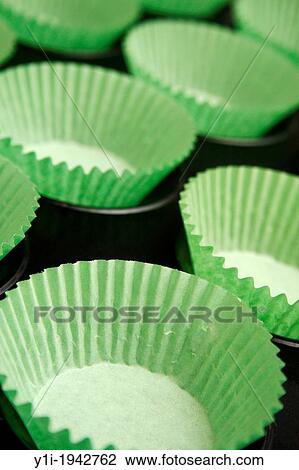 empty green bun cases on bun tray. View Large Photo Image Stock Image - empty green bun cases on bun tray.. Fotosearch