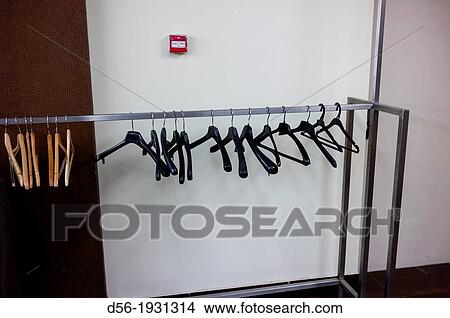 Empty hangers View Large Photo Image Picture - Empty hangers. Fotosearch