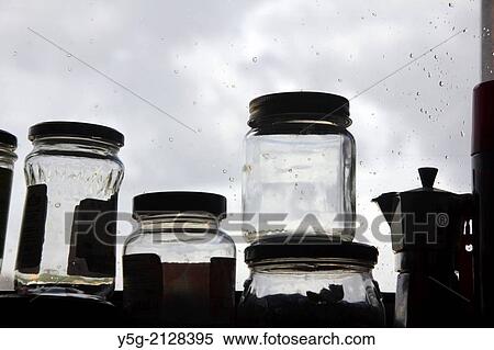 empty jam jars by kitchen window View Large Photo Image Stock Photography - empty jam jars by kitchen window. Fotosearch