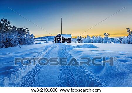 Stock Photograph - Empty road close to the IceHotel, Jukkasjarvi, Lapland Sweden.. Fotosearch