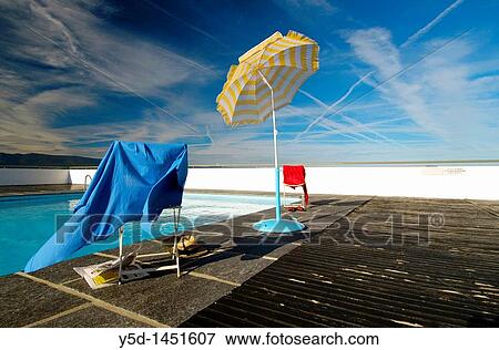 empty swimming pool, the end of summer, wind, sky, clothes, Geneva, Switzerland View Large Photo Image Stock Photo - empty swimming pool, the end of summer, wind, sky, clothes, Geneva, Switzerland. Fotosearch
