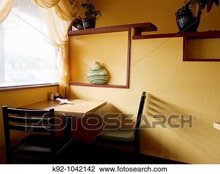 Empty table and chairs in a restaurant in Colorado. View Large Photo Image Stock Image - Empty table and chairs in a restaurant in Colorado.. Fotosearch