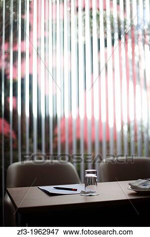 Empty table in a meeting room View Large Photo Image Stock Photo - Empty table in a meeting room. Fotosearch