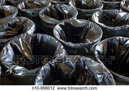 Stock Image - Empty trash containers. Fotosearch
