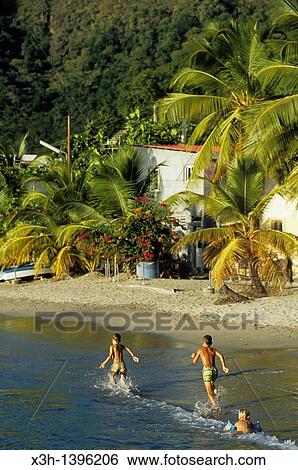 enfants courant sur la plage Les Anses-d? Arlet Ile de la Martinique Departement et Region d? Outremer francais Archipel des Antilles Caraibes//children running on the beach Les Anses-d? Arlet Martinique Island View Large Photo Image Stock Photograph - enfants courant sur la plage Les Anses-d? Arlet Ile de la Martinique Departement et Region d? Outremer francais Archipel des Antilles Caraibes//children running on the beach Les Anses-d? Arlet Martinique Island. Fotosearch