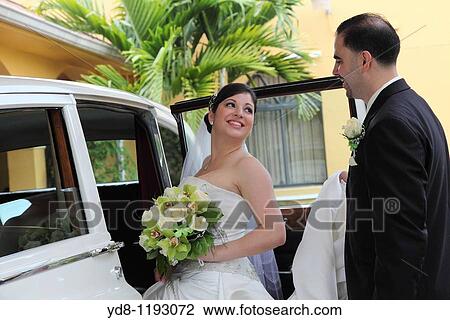 Engaged couple gazing at her wedding day View Large Photo Image Stock Image - Engaged couple gazing at her wedding day. Fotosearch