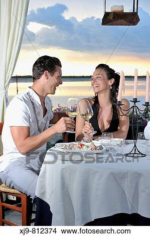 Engaged in the restaurant that toasting. View Large Photo Image Picture - Engaged in the restaurant that toasting.. Fotosearch
