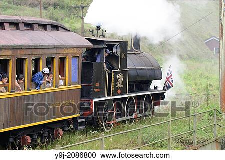 Engine driver reversing a historic steam train at Paranapiacaba station; near Sao Paulo, Brazil. View Large Photo Image Stock Image - Engine driver reversing a historic steam train at Paranapiacaba station; near Sao Paulo, Brazil.. Fotosearch